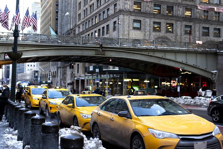 new-york-city-cabs-during-daytime-min-scaled